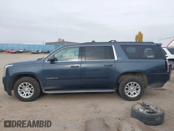 2019 GMC Yukon XL SLT with VIN 1GKS2GKC0KR345860, listed as a IAAI auction lot 40727072 with 127,568 mi miles and . Bid and sale history available at carsss.com. Image 15.