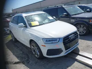 2018 Audi Q3 Premium Plus with VIN WA1JCCFS3JR004895, listed as a IAAI auction lot 41916278 with 14,396 mi miles. Bid and sale history available at carsss.com. Image 1.