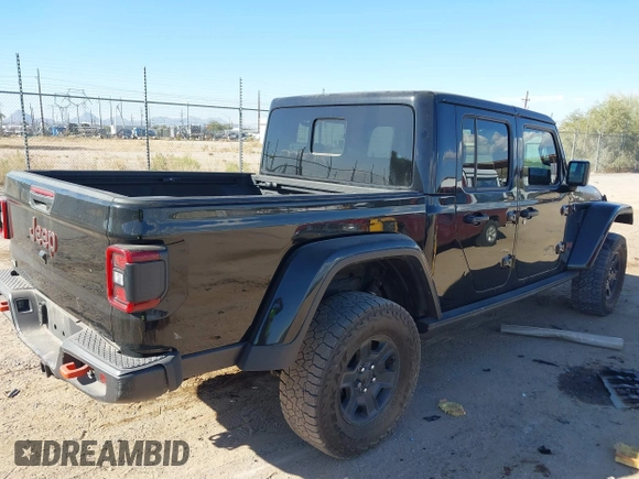2022 Jeep Gladiator Mojave with VIN 1C6JJTEG7NL180485, listed as a IAAI auction lot 41030779 with 41,445 mi miles and . Bid and sale history available at DreamBid. Image 4.