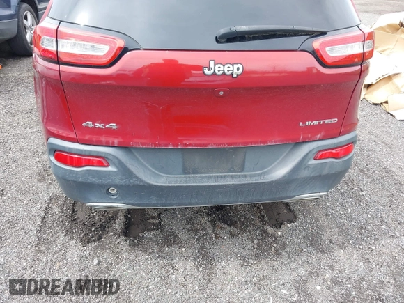 2015 Jeep Cherokee Limited with VIN 1C4PJMDS4FW544604, listed as a IAAI auction lot 41961706 with Not Provided miles and . Bid and sale history available at DreamBid. Image 18.