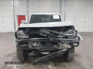 2023 Ford Bronco with VIN 1FMEE5BP7PLC09674, listed as a IAAI auction lot 42049792 with 25,937 mi miles and . Bid and sale history available at DreamBid. Image 12.