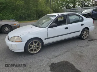 1997 Honda Civic DX z VIN JHMEJ6525VS009951, wystawiony jako Copart lot #60757545 z przebiegiem 205 070 mil mil oraz Czysty tytuł • Clean title. Historia ofert i sprzedaży dostępna na DreamBid. Obrazek 1.