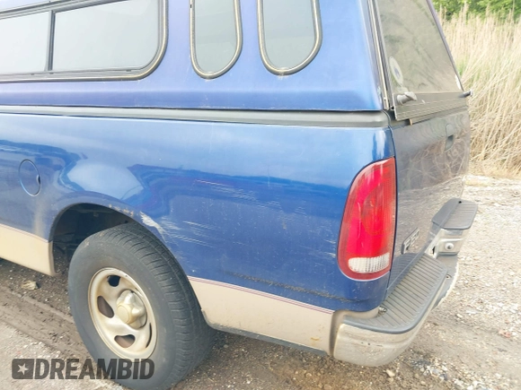 1998 Ford F-150 with VIN 1FTZF1725WNB76296, listed as a IAAI auction lot 42278511 with 223,324 mi miles and . Bid and sale history available at DreamBid. Image 6.