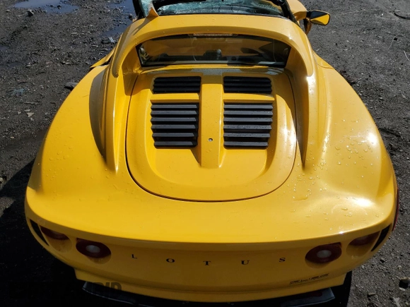 2005 Lotus Elise z VIN SCCPC11185HL34674, wystawiony jako Copart lot #50975385 z przebiegiem 63 194 mil mil oraz Szkody całkowita. Historia ofert i sprzedaży dostępna na DreamBid. Obrazek 10.