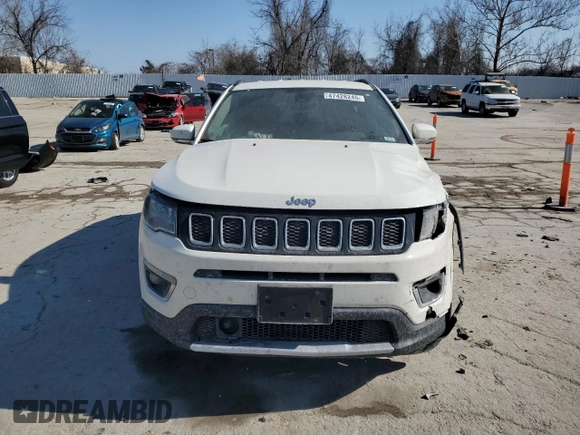 2021 Jeep Compass Limited with VIN 3C4NJDCB4MT556585, listed as a Copart auction lot 47428245 with 99,168 mi miles and Salvage Title. Bid and sale history available at DreamBid. Image 5.