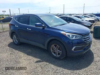 2017 Hyundai Santa Fe 2.4L z VIN 5XYZTDLB7HG429404, wystawiony jako IAAI lot #42306331 z przebiegiem 101 639 mil mil oraz . Historia ofert i sprzedaży dostępna na DreamBid. Obrazek 1.