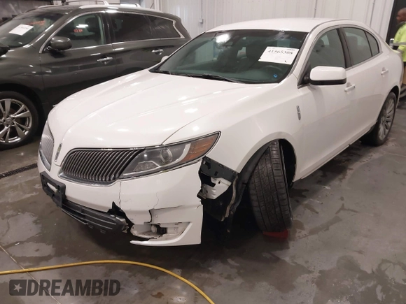 2014 Lincoln MKS with VIN 1LNHL9EK5EG605750, listed as a IAAI auction lot 41565308 with 167,835 mi miles. Bid and sale history available at carsss.com. Image 6.