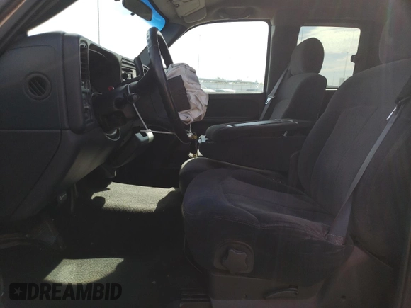 2000 Chevrolet Silverado 1500 LS with VIN 2GCEC19T3Y1202329, listed as a Copart auction lot 52712345 with 149,669 mi miles and Salvage Title. Bid and sale history available at DreamBid. Image 7.