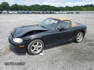 2000 Mazda MX-5 Miata with VIN JM1NB3531Y0147945, listed as a Copart auction lot 60293285 with 63,548 mi miles and Salvage title. Bid and sale history available at DreamBid. Image 1.