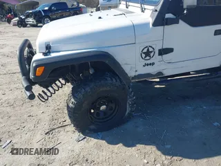 1997 Jeep Wrangler Sport with VIN 1J4FY19S7VP483735, listed as a IAAI auction lot 41469983 with 150,542 mi miles. Bid and sale history available at carsss.com. Image 6.