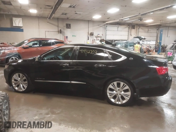 2014 Chevrolet Impala LTZ with VIN 2G1155S32E9134167, listed as a IAAI auction lot 41932703 with 196,492 mi miles and . Bid and sale history available at DreamBid. Image 14.