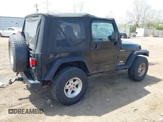 2006 Jeep Wrangler Sport with VIN 1J4FA49S76P718349, listed as a IAAI auction lot 42098356 with 137,804 mi miles and . Bid and sale history available at carsss.com. Image 4.