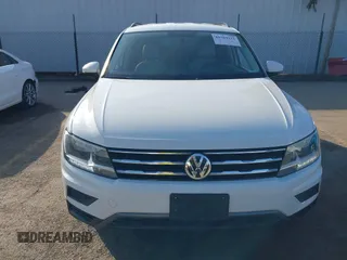 2020 Volkswagen Tiguan S z VIN 3VV1B7AX4LM098567, wystawiony jako IAAI lot #41504191 z przebiegiem 106 012 mil mil oraz . Historia ofert i sprzedaży dostępna na DreamBid. Obrazek 13.