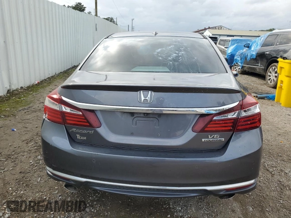 2017 Honda Accord Touring with VIN 1HGCR3F97HA000952, listed as a Copart auction lot 60136685 with 209,493 mi miles and Salvage title. Bid and sale history available at DreamBid. Image 6.