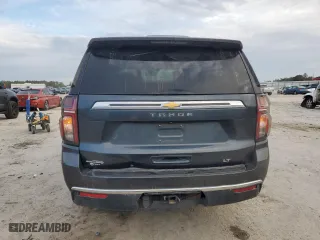 2021 Chevrolet Tahoe LT with VIN 1GNSCNKD5MR252123, listed as a Copart auction lot 42582425 with 114,130 mi miles and Salvage Title. Bid and sale history available at carsss.com. Image 6.