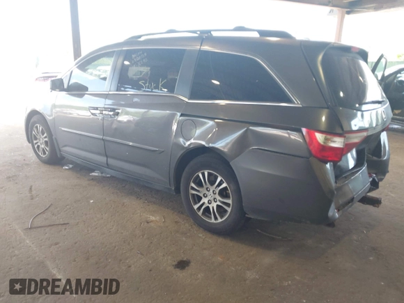 2012 Honda Odyssey EX-L with VIN 5FNRL5H67CB016934, listed as a IAAI auction lot 42405714 with 248,512 mi miles and . Bid and sale history available at DreamBid. Image 3.