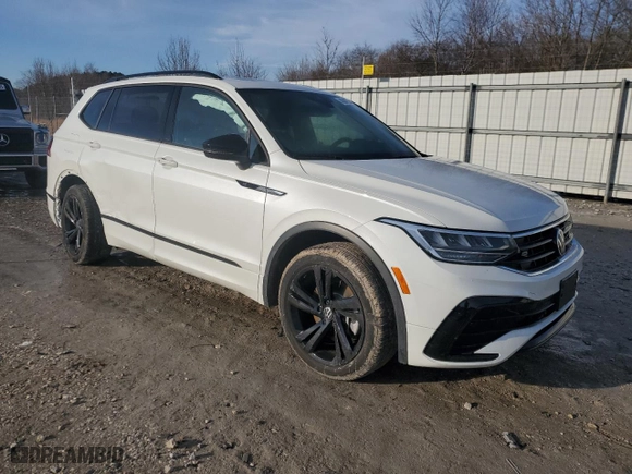2023 Volkswagen Tiguan SE R-Line Black with VIN 3VVCB7AX8PM121086, listed as a Copart auction lot 45601555 with 27,571 mi miles and Salvage Title. Bid and sale history available at carsss.com. Image 4.