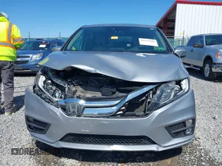 2018 Honda Odyssey EX-L with VIN 5FNRL6H75JB092633, listed as a IAAI auction lot 41971589 with 103,099 mi miles and . Bid and sale history available at DreamBid. Image 13.