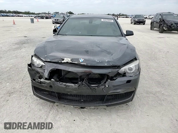 2011 BMW 7 Series 740Li with VIN WBAKB4C53BC574284, listed as a Copart auction lot 86628084 with 77,760 mi miles and Salvage title. Bid and sale history available at DreamBid. Image 10.