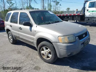 2001 Ford Escape XLT with VIN 1FMYU03141KE84977, listed as a IAAI auction lot 41773564 with 291,773 mi miles. Bid and sale history available at carsss.com. Image 1.