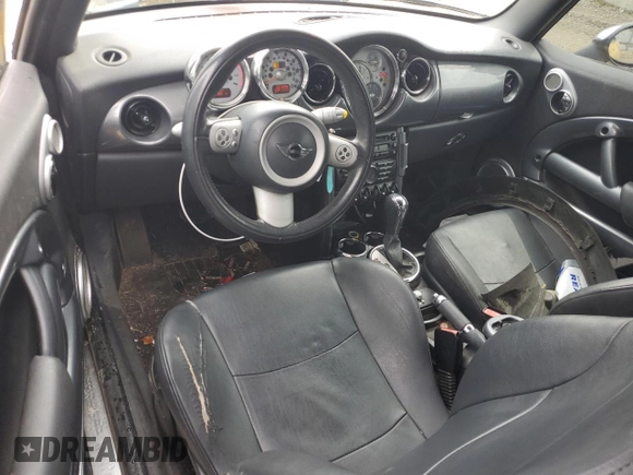 2007 MINI Convertible with VIN WMWRF33507TG17373, listed as a Copart auction lot 52818825 with 207,096 mi miles and Salvage Title. Bid and sale history available at DreamBid. Image 8.