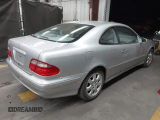 2001 Mercedes-Benz CLK with VIN WDBLJ65GX1T091389, listed as a IAAI auction lot 42058375 with 215,750 mi miles. Bid and sale history available at carsss.com. Image 4.