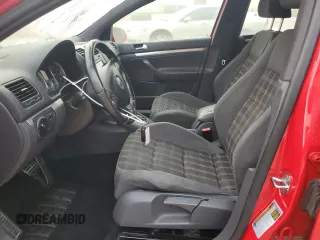 2009 Volkswagen Golf GTI z VIN WVWHV71K89W118353, wystawiony jako Copart lot #63072245 z przebiegiem 124 546 mil mil oraz Szkoda całkowita • Salvage title. Historia ofert i sprzedaży dostępna na DreamBid. Obrazek 7.