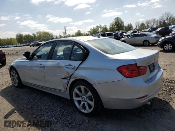 2014 BMW 3 Series 335i xDrive with VIN WBA3B9C56EP458673, listed as a Copart auction lot 52934245 with 37,852 mi miles and Salvage title. Bid and sale history available at DreamBid. Image 2.