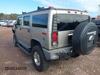 2005 Hummer H2 SUV with VIN 5GRGN23U65H101545, listed as a IAAI auction lot 41426274 with 293,821 mi miles. Bid and sale history available at carsss.com. Image 3.