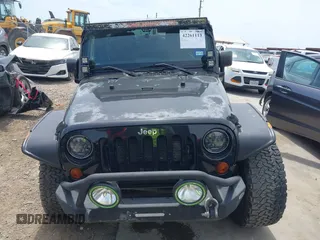 2012 Jeep Wrangler Unlimited Sport with VIN 1C4BJWDG3CL200826, listed as a IAAI auction lot 42261113 with 135,554 mi miles and . Bid and sale history available at DreamBid. Image 13.