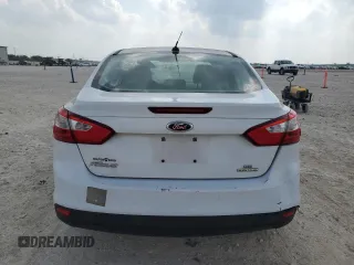 2013 Ford Focus SE z VIN 1FADP3F2XDL198801, wystawiony jako Copart lot #51985455 z przebiegiem 115 747 mil mil oraz Szkoda całkowita • Salvage title. Historia ofert i sprzedaży dostępna na DreamBid. Obrazek 6.