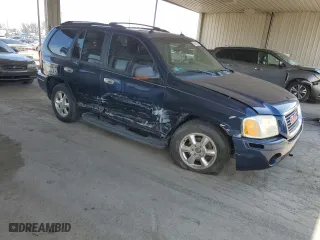 2004 GMC Envoy SLE with VIN 1GKDT13S142201271, listed as a Copart auction lot 50249705 with 248,364 mi miles and Salvage Title. Bid and sale history available at carsss.com. Image 4.