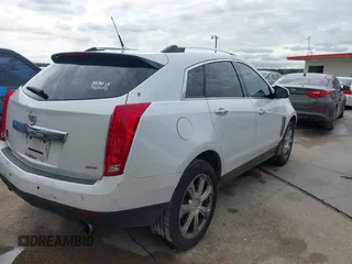 2013 Cadillac SRX Performance Collection z VIN 3GYFNDE38DS542736, wystawiony jako IAAI lot #42398648 z przebiegiem 266 059 mil mil oraz . Historia ofert i sprzedaży dostępna na DreamBid. Obrazek 6.