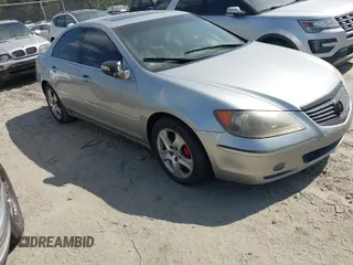 2007 Acura RL Tech Pkg with VIN JH4KB16647C004578, listed as a IAAI auction lot 42062919 with 162,968 mi miles. Bid and sale history available at carsss.com. Image 1.