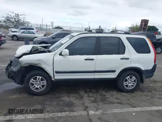 2003 Honda CR-V EX z VIN JHLRD78893C033020, wystawiony jako IAAI lot #42440473 z przebiegiem Nie podano mil oraz . Historia ofert i sprzedaży dostępna na DreamBid. Obrazek 14.