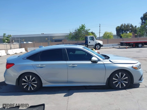 2022 Honda Civic Sedan EX with VIN 2HGFE1F77NH309152, listed as a IAAI auction lot 42013565 with 25,474 mi miles. Bid and sale history available at carsss.com. Image 14.