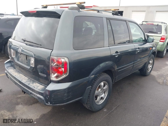 2006 Honda Pilot EX-L with VIN 2HKYF18526H563831, listed as a IAAI auction lot 41255427 with 237,074 mi miles. Bid and sale history available at carsss.com. Image 4.