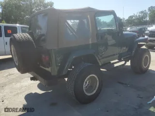 1999 Jeep Wrangler Sahara with VIN 1J4FY49S6XP478675, listed as a Copart auction lot 52147605 with 157,971 mi miles and Salvage Title. Bid and sale history available at carsss.com. Image 3.
