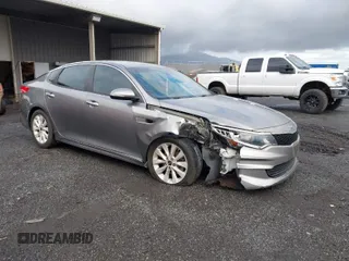2017 Kia Optima LX with VIN 5XXGT4L34HG176918, listed as a IAAI auction lot 41473822 with 74,789 mi miles. Bid and sale history available at carsss.com. Image 1.