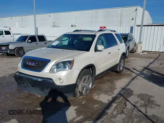 2010 GMC Acadia SLT1 with VIN 1GKLVMED0AJ167282, listed as a IAAI auction lot 41227299 with 121,293 mi miles. Bid and sale history available at carsss.com. Image 2.