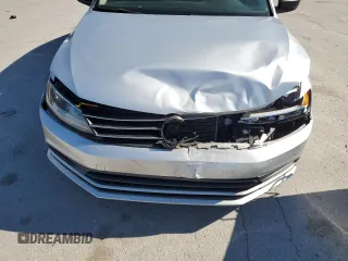 2015 Volkswagen Jetta S z VIN 3VW2K7AJ1FM297799, wystawiony jako Copart lot #57382305 z przebiegiem 107 279 mil mil oraz Czysty tytuł • Clean title. Historia ofert i sprzedaży dostępna na DreamBid. Obrazek 11.