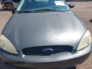 2005 Ford Taurus SE with VIN 1FAFP532X5A272398, listed as a IAAI auction lot 42001798 with 159,199 mi miles. Bid and sale history available at carsss.com. Image 10.