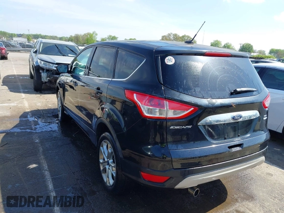 2013 Ford Escape SEL with VIN 1FMCU9H94DUA10002, listed as a IAAI auction lot 41963247 with 85,941 mi miles. Bid and sale history available at carsss.com. Image 3.
