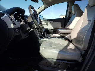 2012 Chevrolet Traverse LTZ z VIN 1GNKRLED7CJ261692, wystawiony jako Copart lot #49294845 z przebiegiem 207 616 mil mil oraz Czysty tytuł • Clean title. Historia ofert i sprzedaży dostępna na DreamBid. Obrazek 7.