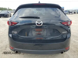2020 Mazda CX-5 Grand Touring with VIN JM3KFBDM4L0738976, listed as a Copart auction lot 56683955 with 191,650 mi miles and Clean Title. Bid and sale history available at DreamBid. Image 6.