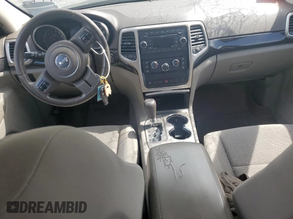 2011 Jeep Grand Cherokee Laredo with VIN 1J4RR4GG7BC515001, listed as a Copart auction lot 56432905 with 143,181 mi miles and Salvage title. Bid and sale history available at DreamBid. Image 8.