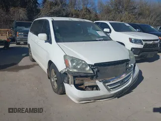 2006 Honda Odyssey EX with VIN 5FNRL38426B400952, listed as a IAAI auction lot 41346853 with 210,826 mi miles and . Bid and sale history available at DreamBid. Image 1.