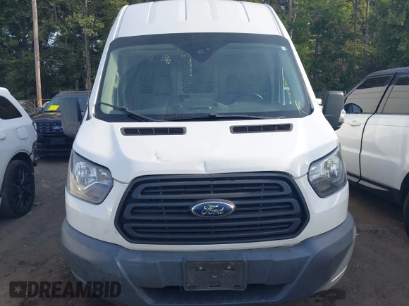 2017 Ford Transit Cargo with VIN 1FTBW3XG9HKA80524, listed as a IAAI auction lot 37520715 with 98,524 mi miles. Bid and sale history available at carsss.com. Image 12.