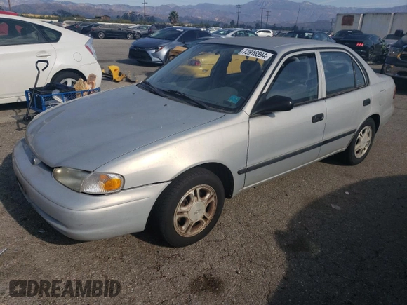 2001 Chevrolet Prizm z VIN 1Y1SK52811Z447352, wystawiony jako Copart lot #73916394 z przebiegiem 89 265 mil mil oraz Szkoda całkowita • Salvage title. Historia ofert i sprzedaży dostępna na DreamBid. Obrazek 1.