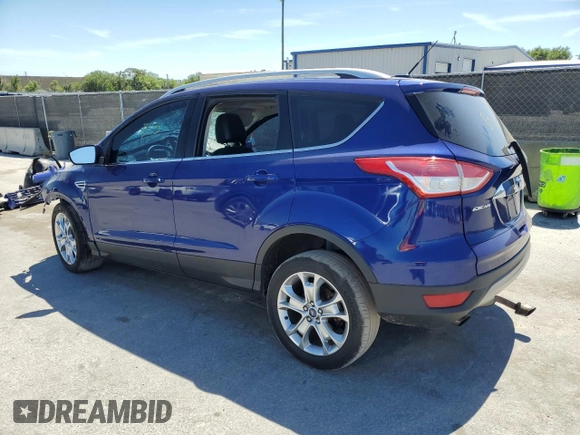 2015 Ford Escape Titanium with VIN 1FMCU9J90FUA70923, listed as a Copart auction lot 49832155 with 142,600 mi miles and Salvage title. Bid and sale history available at DreamBid. Image 2.